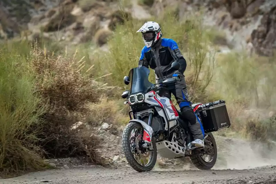 Ducati DesertX fully equipped with Wunderlich parts & Accessories ripping it in the Desert.